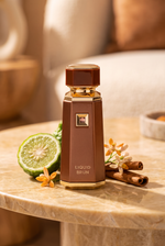 French Avenue Liquid Brun Eau de Parfum bronzefarbener Flakon auf Marmor mit Bergamotte, Orangenbluete und Zimt - kaufenparfum.de