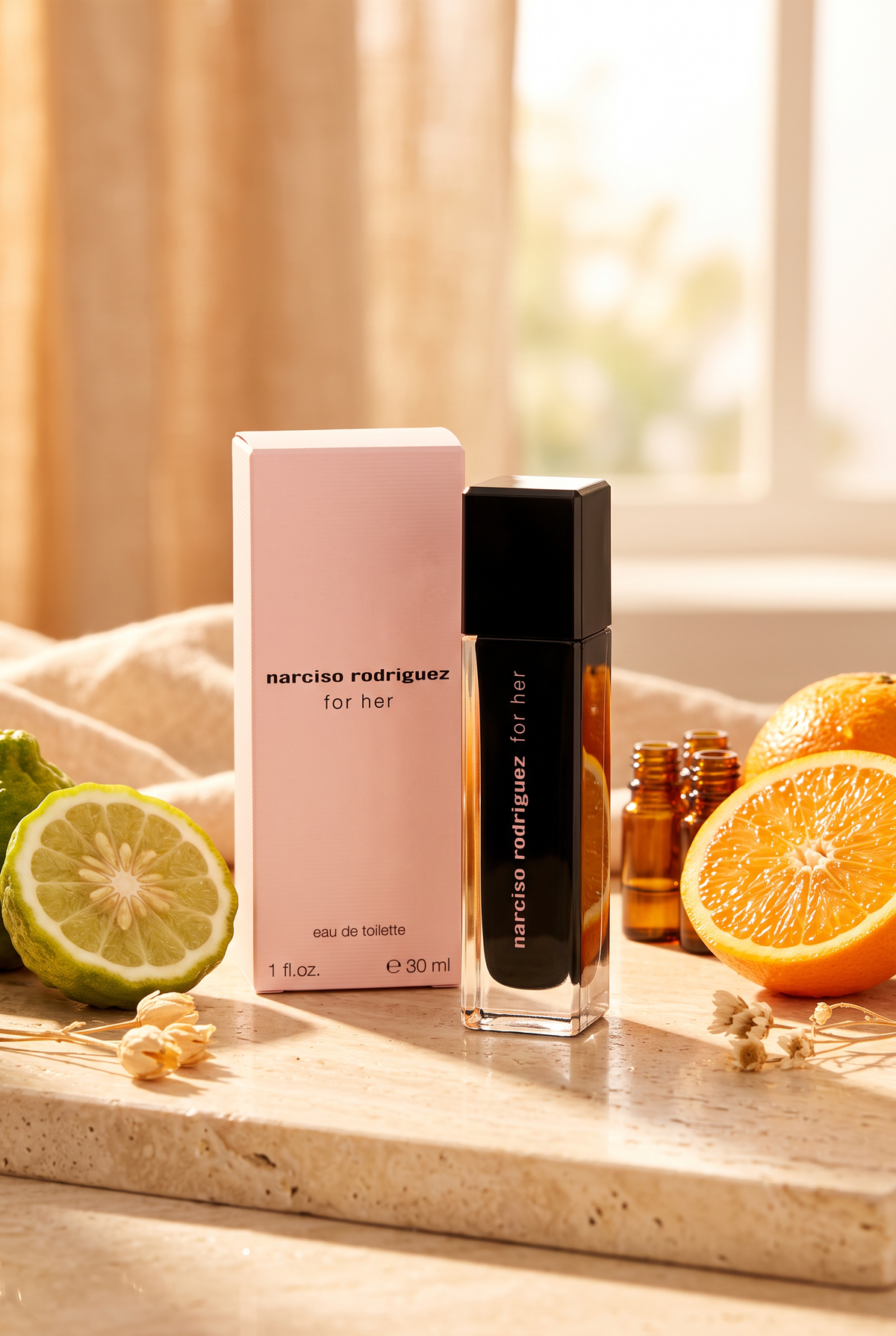 Narciso Rodriguez for Her Eau de Toilette schwarzer Flakon mit rosa Schachtel im Morgenlicht mit Orange und Bergamotte - kaufenparfum.de