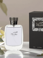 Rasasi Hawas for Him Eau de Parfum Flasche mit Verpackung auf hellem Marmor - kaufenparfum.de